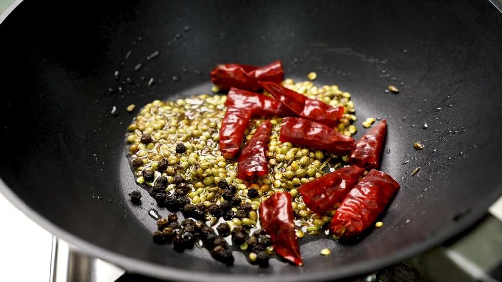 red chilies and black peppercorns